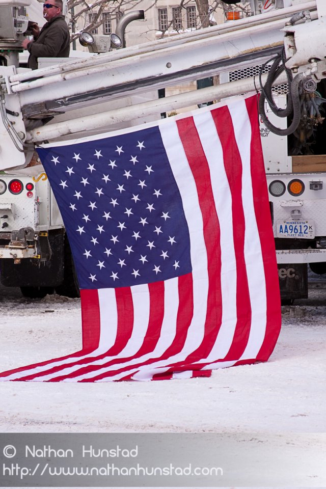 A flag drapes along the ground in front of the House of Hope Presbyterian Church on Summit Avenue